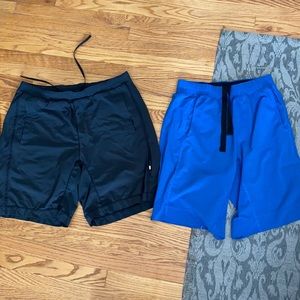 Two pairs men M lululemon shorts